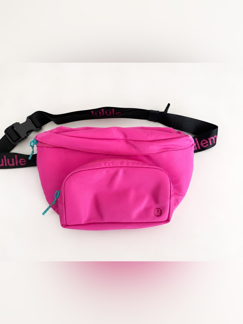 lululemon athletica Bright Pink Crossbody Waist Bag with Black Strap